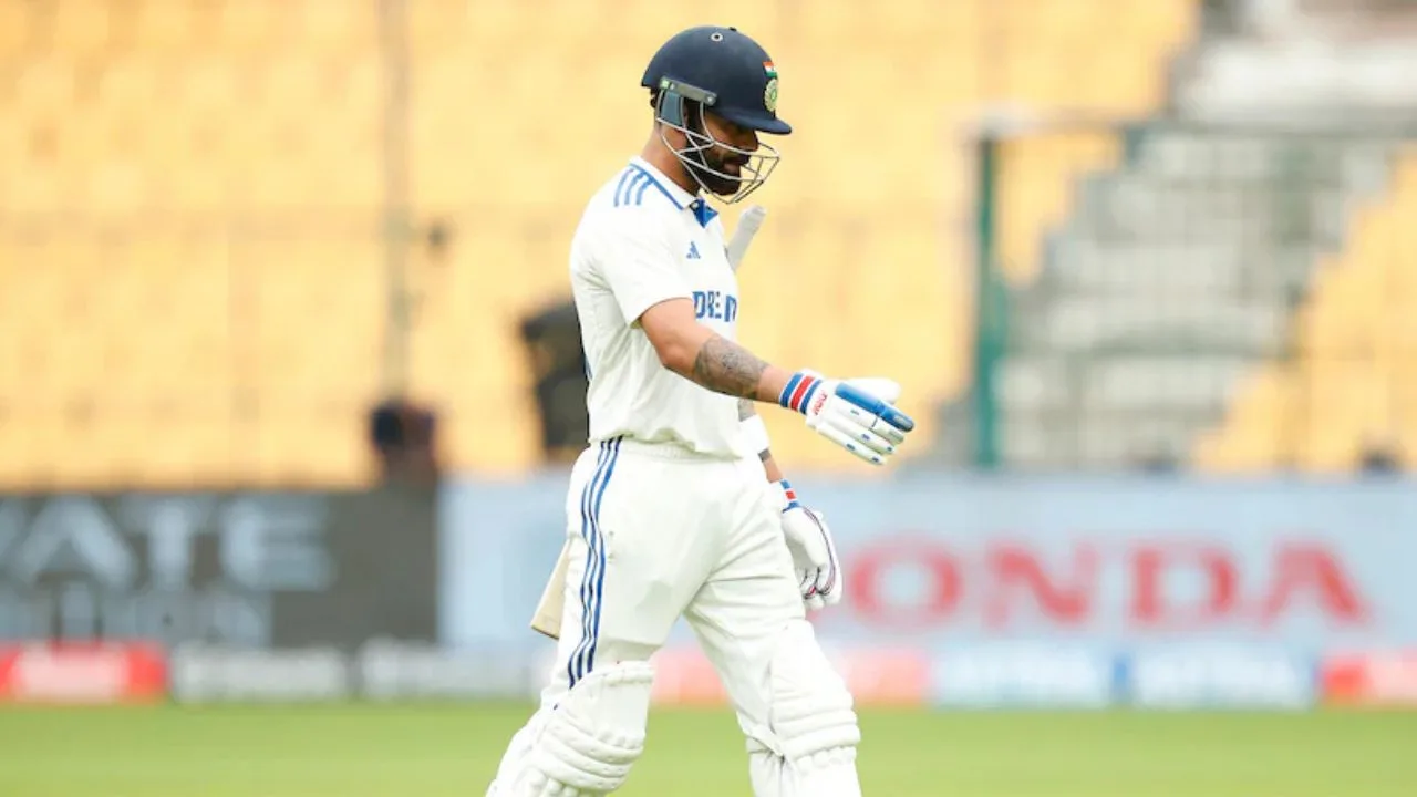 Kohli walks back for a duck in the India vs. New Zealand Test.