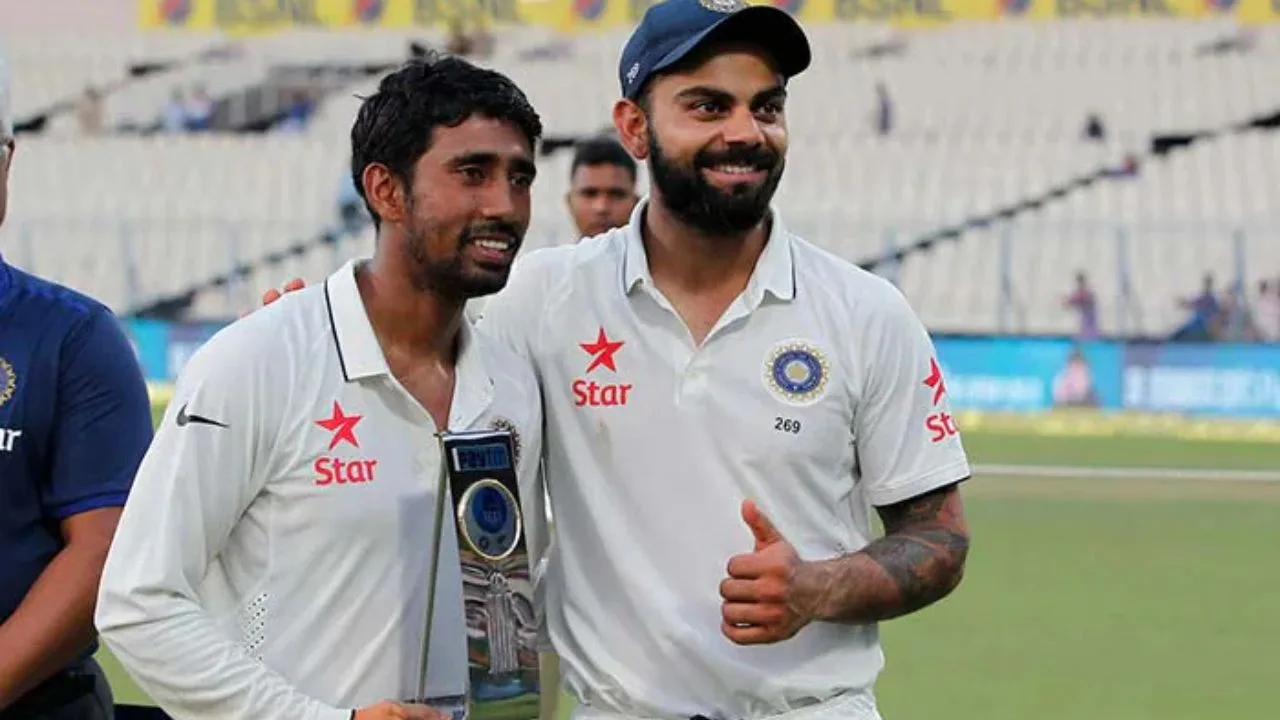 Wriddhiman Saha and Virat Kohli 